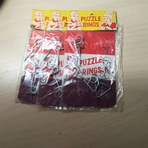LOT OF THREE VINTAGE DIME STORE TOY, NOS : PUZZLE RINGS - Picture 1 of 8