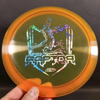 💥💸Discraft Cryztal Raptor Ledgestone Crest Sheild Orange Money Flipfoil Stamp - Image 1 of 4