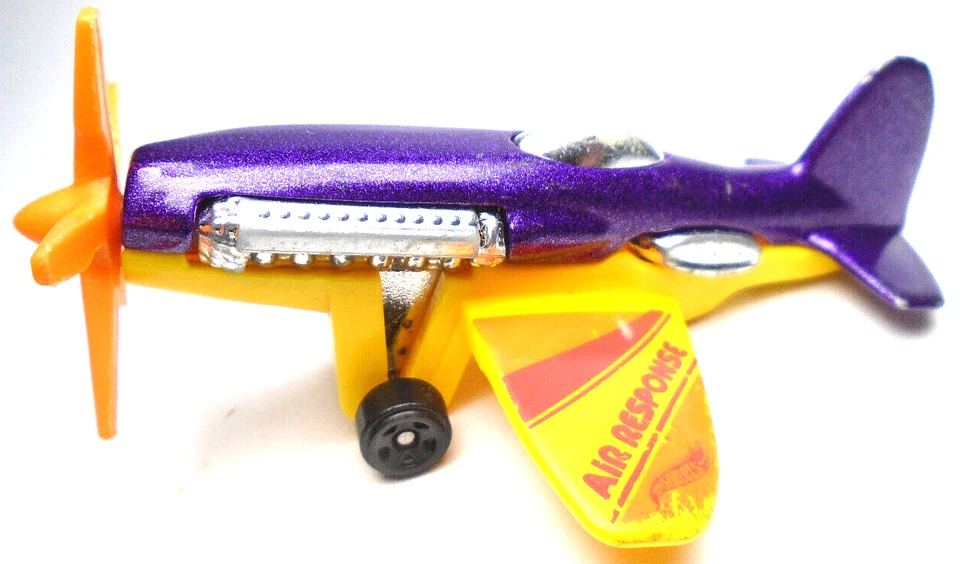2020 HOT WHEELS MAD PROPZ AIR RESPONSE PURPLE & YELLOW 3" DIECAST AIRPLANE W RED - Image 1 of 4