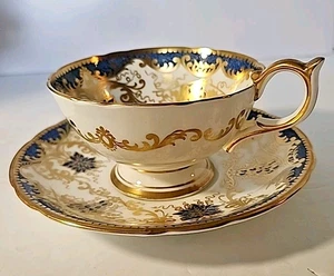 Taza y platillo Ansley banda azul real en blanco dorado con oro - Imagen 1 de 3