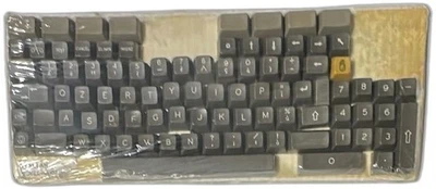 Vintage 1980s Italian QZERTY Replacement Keycap Set Gray Plastic With Icons - Image 1 of 4