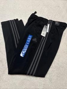 Adidas Pantaloni Uomo 3 Strisce Tricot Conici Track Nero con Strisce Grigie Large - Foto 1 di 11