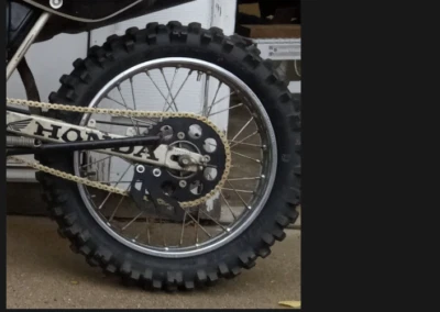 Honda Rear Sprocket Chain Guard XR80R XR100R CRF80F CRF100F(85-13) 52156-GN1-000 - Image 1 of 3