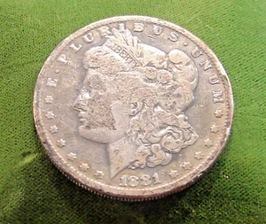 1881-S--- Dollaro d'argento Morgan - Moneta circolata--90% argento - Foto 1 di 2