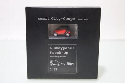 Smart City-Coupe mad red 1:87 + Bodymanel Fresh-Up Hello Yellow - Bild 1 von 4