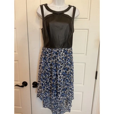 Material Niña Imitación Cuero Corpiño Semi Transparente Falda Sin Mangas Fiesta Evento XL Foto 1 de 4