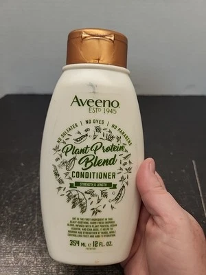 Acondicionador Mezcla Proteína Vegetal Aveeno 12 Fl Oz Control del Frizz y Rea Nutritiva Foto 1 de 4