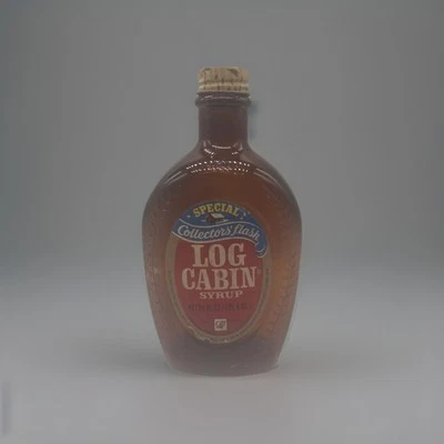 Botella de jarabe de cabaña de troncos vintage en relieve con cabeza india frasco de coleccionistas vacío Foto 1 de 4