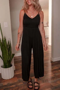Jumpsuit schwarz Spaghettiträger hinten offen Plissee weites Bein - Bild 1 von 8
