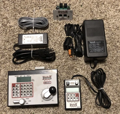 Sistema DCC Digitrax DCS51 DT300 PS314 PS515 UP5 con cable no probado Foto 1 de 4