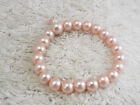 Bracelet extensible perle en verre rose (G7)