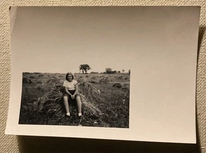 Vintage Photo Young Girl Sitting On Haystack In Field Black & White 4.5" x 3.25" - Picture 1 of 2
