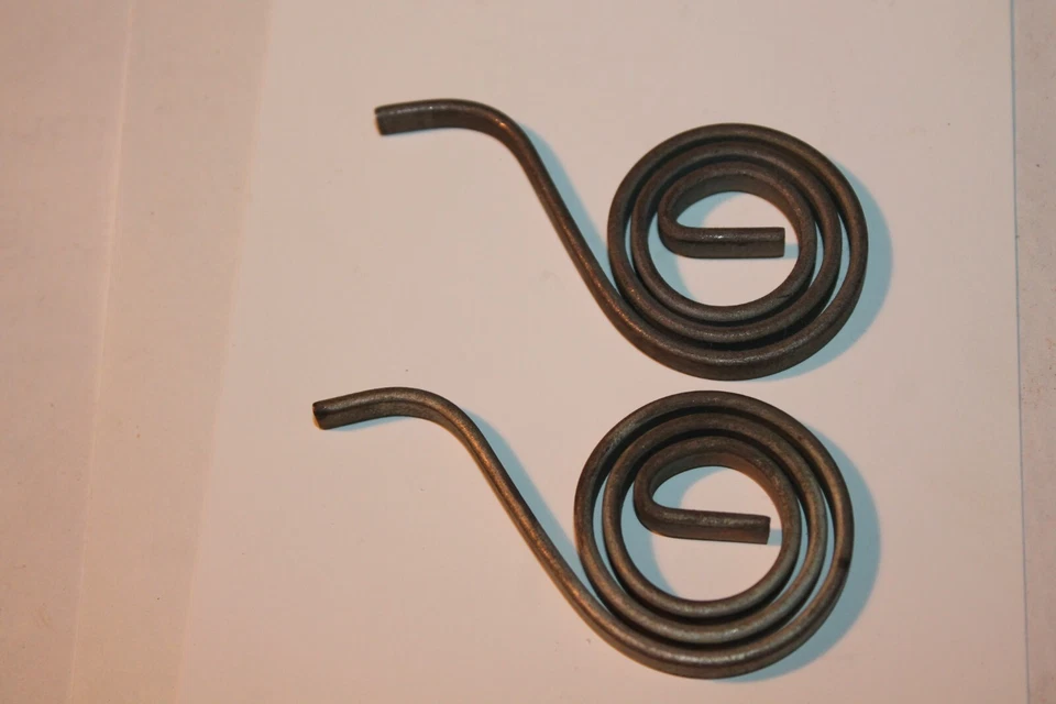 FORDS, GRAHAM, DESOTO, DODGE&PLYMOUTH, CHRYSLER, MANGO DEL CAPÓ RESORTES DE RETORNO Foto 1 de 1