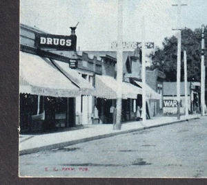 Tarjeta postal antigua Littleton Colorado farmacia tren ferrocarril tierra calle principal vista - Imagen 1 de 11