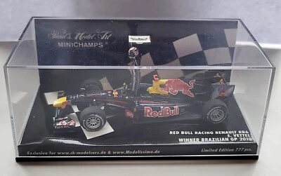 Minichamps 1:43 2010 Red Bull Racing Renault Sebastian Vettel Brazilian GP LTD - Image 1 of 3