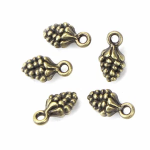 10 Small Antique Bronze Tone Winter Christmas Pine Cone Shaped Charms 13x7mm  - Picture 1 of 2