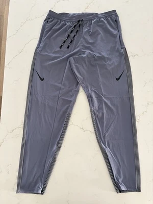 Pantalones de correr Nike AeroSwift Dri-FIT ADV grises FN3361-003 para hombre talla grande” Foto 1 de 4