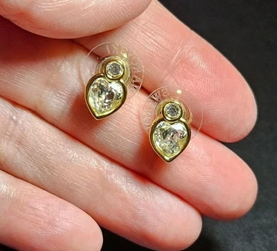 Brincos de coração de cristal Swarovski transparente tom dourado - Imagem 1 de 4