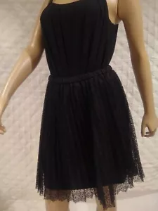 Falda plisada y acampanada encaje forrada en negro. Fantasioso y femenino. Talla XS - Imagen 1 de 5