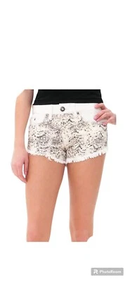 Pantalones cortos blancos Daytrip Capricornio Margarita Duque Dobladillo Fray para mujer con elástico Foto 1 de 4