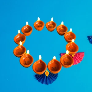 Lámpara de vela flotante con sensor de agua 12X LED Diwali Diya - Luz LED de té sin llama - Imagen 1 de 9