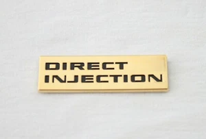 2008 - 2019 CADILLAC CTS "DIRECT INJECTION" 24K GOLD PLATED EMBLEM 25844607 NEW - Picture 1 of 2