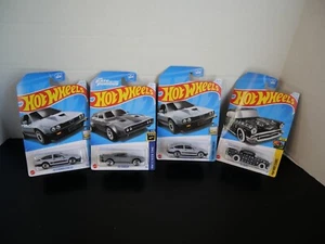 Hot Wheel Bundle: 2 Alfa Romeo GTV6, 1 '57 chevy, and 1 Ice charger - Sealed - Picture 1 of 4