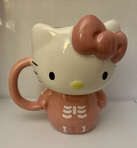 2024 Hello Kitty Halloween rosa/weiß Skelett Tasse - Bild 1 von 6