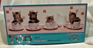 De colección-1992- Nuevo Sellado Ceaco 700 piezas ENVÍO GATO-PUCCINO #2909 Rompecabezas Largo-12" X 34" - Imagen 1 de 6