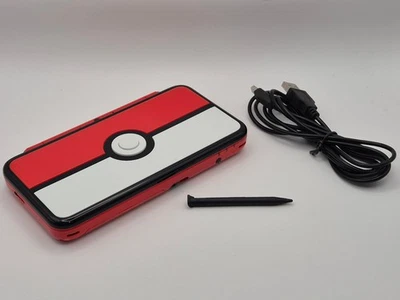 'New' Nintendo 2DS XL Handheld Console AUS PAL Pokeball Edition + Charger - image 1 of 4