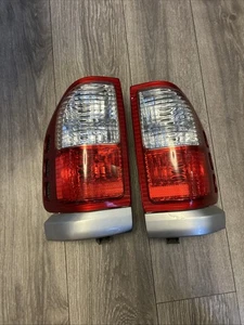 2002 Isuzu Rodeo Tail Light Tail Lamp Passenger And Driver Side Silver - Picture 1 of 8