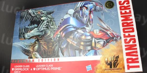 Hasbro TRANSFORMERS AOE Platinum Edition Grimlock & Optimus Prime Leader Class - Picture 1 of 3