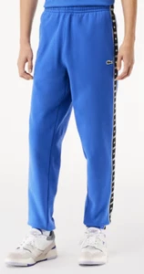 Lacoste Mens Logo Strip Tapered Fit Sweatpants in Saphir Blue.     C22 - Picture 1 of 13
