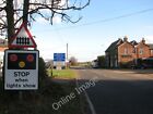 Photo 6x4 Approaching the level crossing on Station Road (B1134) Hales St c2009