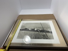 RESTING ON A GIRDER PICTURE FRAMED 