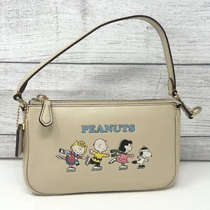 Cartera Coach X Peanuts Nolita 19 con motivo Snoopy And Friends marfil multi CE858 - Imagen 1 de 11