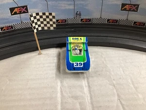 AFX AURORA TOMY #39 LOLA T-260 CAN-AM ROAD RACER MAGNATRACTION CHASSIS SLOT CAR - Photo 1/8