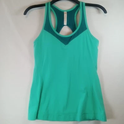 Camiseta sin mangas deportiva Lucy verde con inserción de sujetador para mujer talla mediana Foto 1 de 4