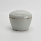 A LIDDED POT BY PETER SWANSON, STONEWARE WITH A BEAUTIFUL CELADON GLAZE.