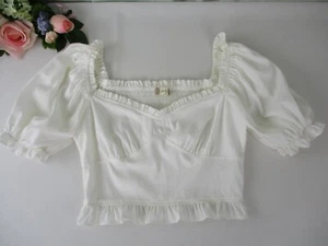 Top corsetto Altar'd State taglia M bianco manica a sbuffo smoking, scollo a cuore - Foto 1 di 10