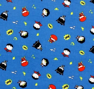 Pequeños superhéroes en tela de franela de algodón azul por yarda Foto 1 de 3
