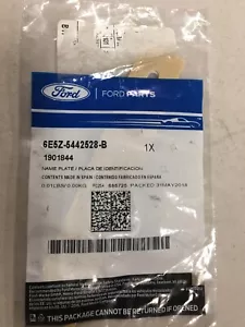 NOS 6E5Z5442528B ''SE'' 2006-2022 FORD FOCUS, C-MAX TRUNK OR DECK LID NAMEPLATE - Picture 1 of 2