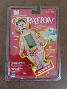 NUEVO juego electrónico portátil Hasbro Operation 1998 sellado de fábrica - Imagen 1 de 4