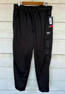 Pantaloni sportivi Reebok uomo taglia small neri Tremont slim fit pantaloni pile nuovi - Foto 1 di 3