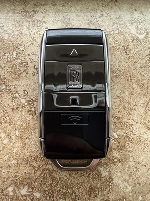 ROLLS ROYCE SMART KEY REMOTE FOB FCC: YG0HUF7059 (4-BUTTON) EXCELLENT! - Image 1 of 4
