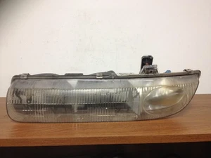 1996 SATURN SL LEFT/DRIVER HEADLIGHT 4DR OEM - Picture 1 of 1