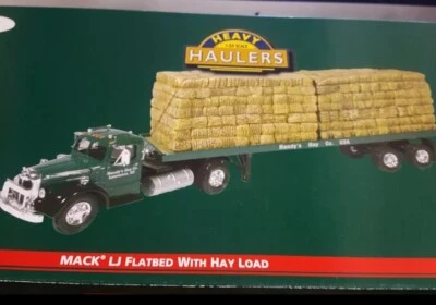 Corgi  Mack U Flatbed w/hay load 1/50 scale diecast - Image 1 of 3