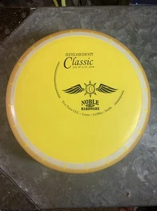 Disco de golf amarillo Innova XT Nova 175 G 2016 clásico del condado de Cleveland - Imagen 1 de 7