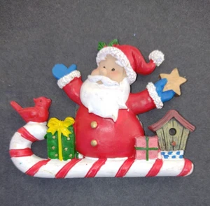 Calamita natalizia Babbo Natale in resina su canna di caramelle - Foto 1 di 2