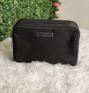 black gucci toiletry bolsa